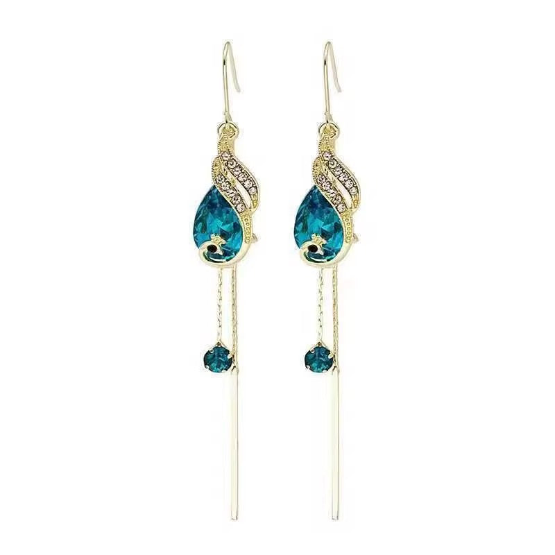 Boucles d'Oreilles "Goutte Royale" – Cristal Bleu Facetté et Cascades Dorées