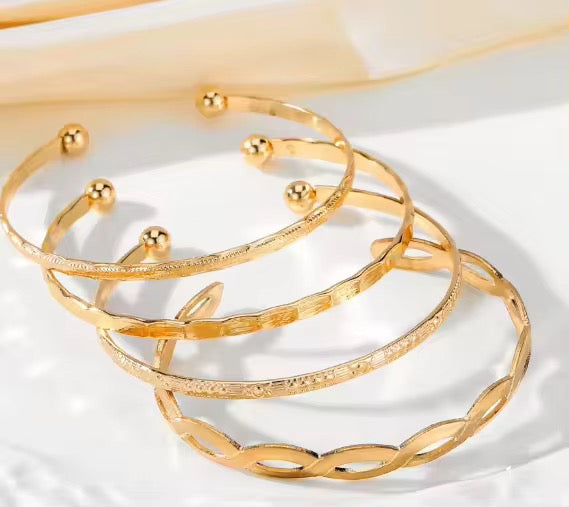 Collection "Aura Dorée" – Ensemble de 4 Bracelets Joncs aux Motifs Géométriques